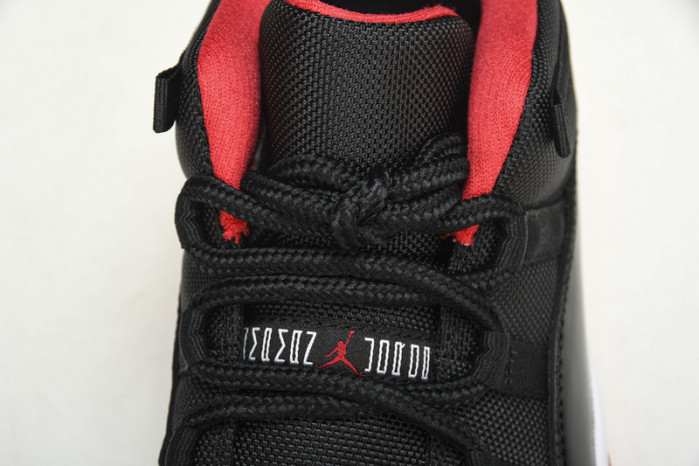 air jordan 11 retro low "bred" black/ red mens 528895-012